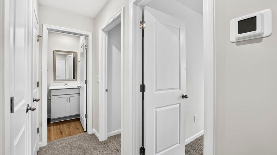Spacious, unfurnished interior of a new home in Tanglewood Townes, Greenville (Image 27).