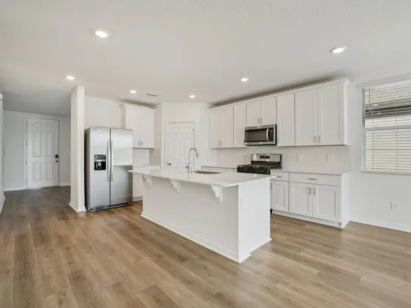 Furnished interior view inside a new home in The Reserve at Twin Lakes, St. Cloud (Image 3).