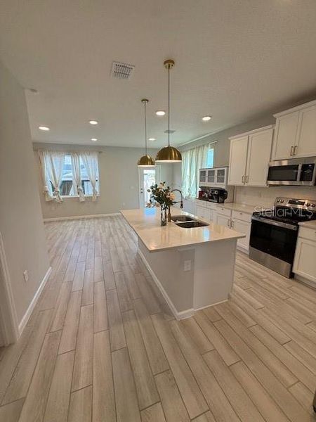 Furnished interior view inside a new home in , Winter Garden (Image 15).