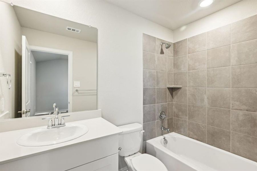 Photo is not of the actual home, but is an inspirational photo of builder’s model home and may depict options, furnishings, and/or decorator features that are not included.