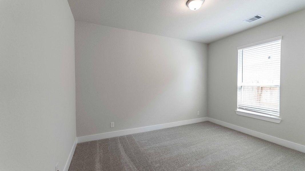 Spacious, unfurnished interior of a new home in Sunterra, Katy (Image 13).