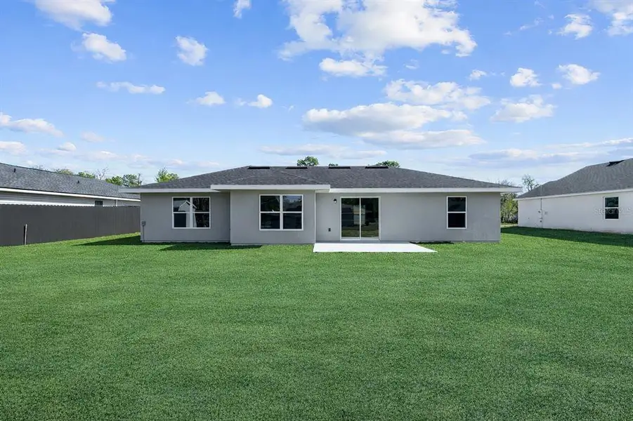 Exterior details and patio area of a home in , Ocala (Image 3).