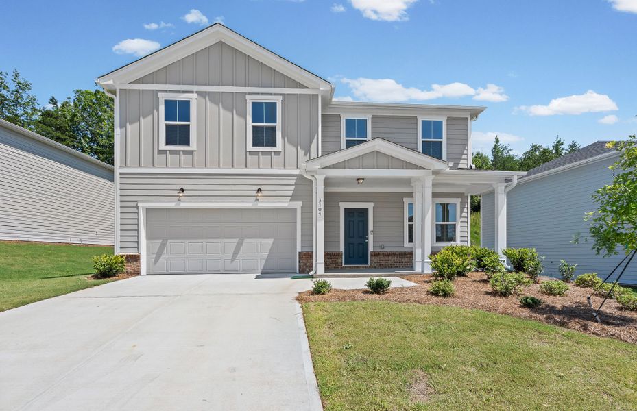 Front exterior of a new home in Avery Ridge, Gainesville, GA, highlighting curb appeal (Image 18). Front exterior of a new home in Avery Ridge, Gainesville, GA, highlighting curb appeal (Image 18).