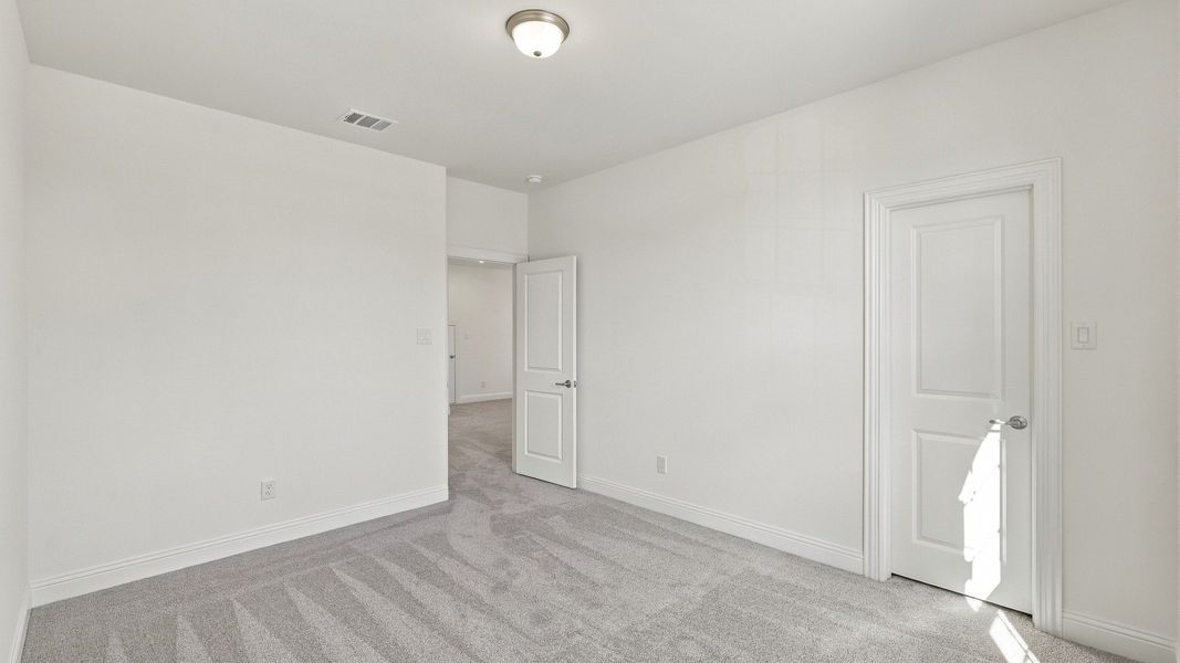 Furnished interior view inside a new home in Green Meadows Classic, Celina (Image 19).