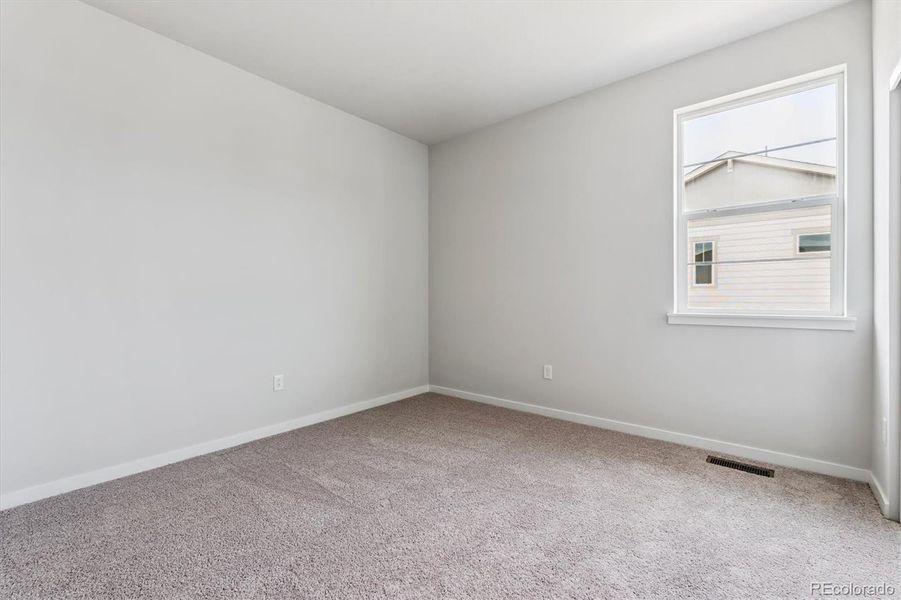 Spacious, unfurnished interior of a new home in Floret Collection at Parkdale Commons, Lafayette (Image 18).