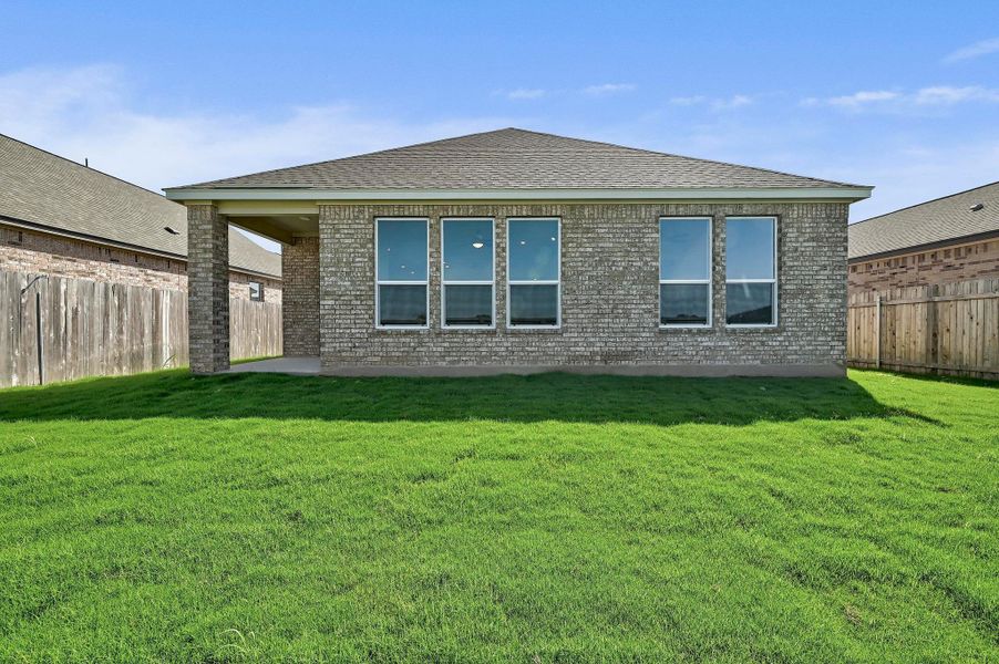Front exterior of a new home in Centerpoint Meadows, Lockhart, TX, highlighting curb appeal (Image 17). Front exterior of a new home in Centerpoint Meadows, Lockhart, TX, highlighting curb appeal (Image 17).