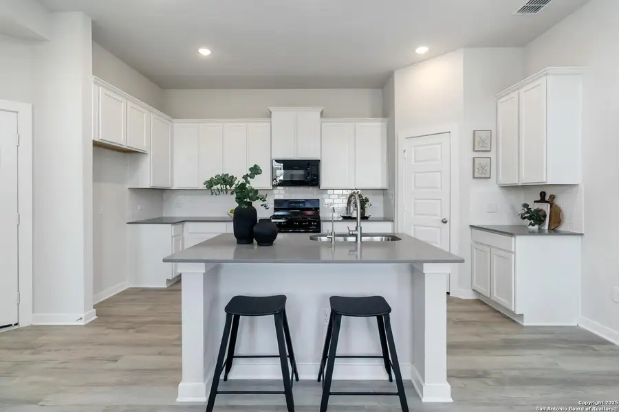 Furnished interior view inside a new home in Hickory Ridge, Elmendorf (Image 12).