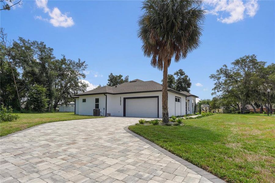 Front exterior of a new home in , Leesburg, FL, highlighting curb appeal (Image 2).