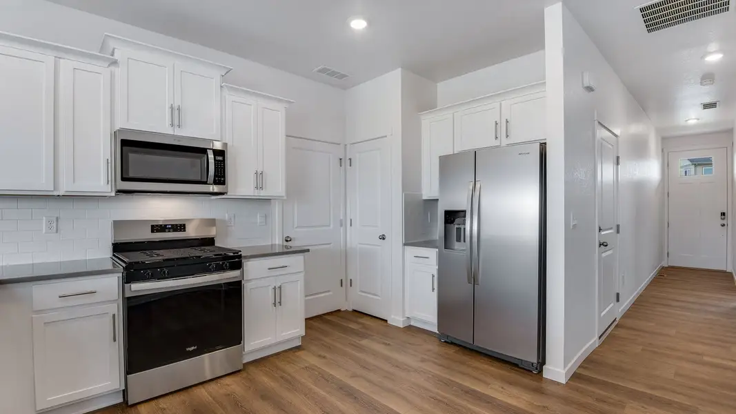 Furnished interior view inside a new home in Silver Peaks, Lochbuie (Image 5).