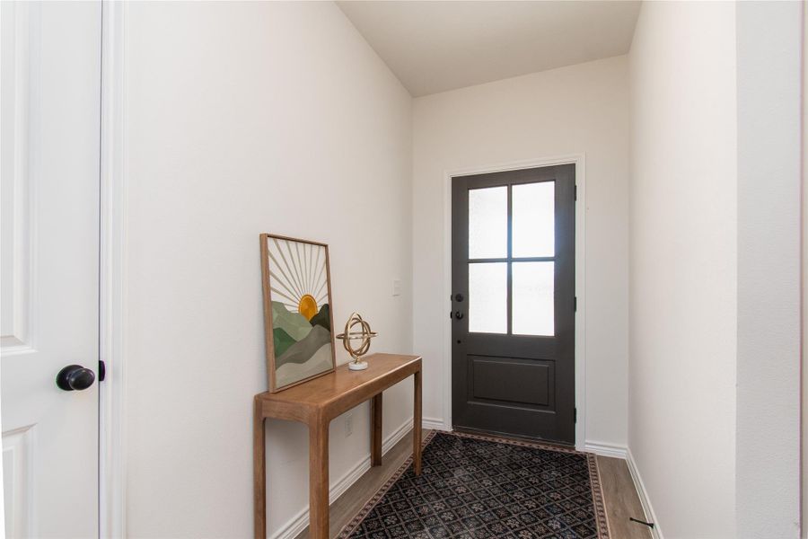 Entryway featuring baseboards