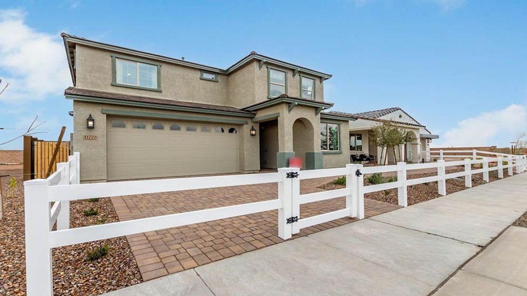 Representative exterior photo of a completed home built from the Paisley by Taylor Morrison in Paradisi Discovery Collection, Surprise, AZ (Image 26).