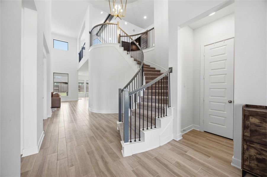 Flooded with natural light, the grand foyer establishes an elegant transition into the heart of the home