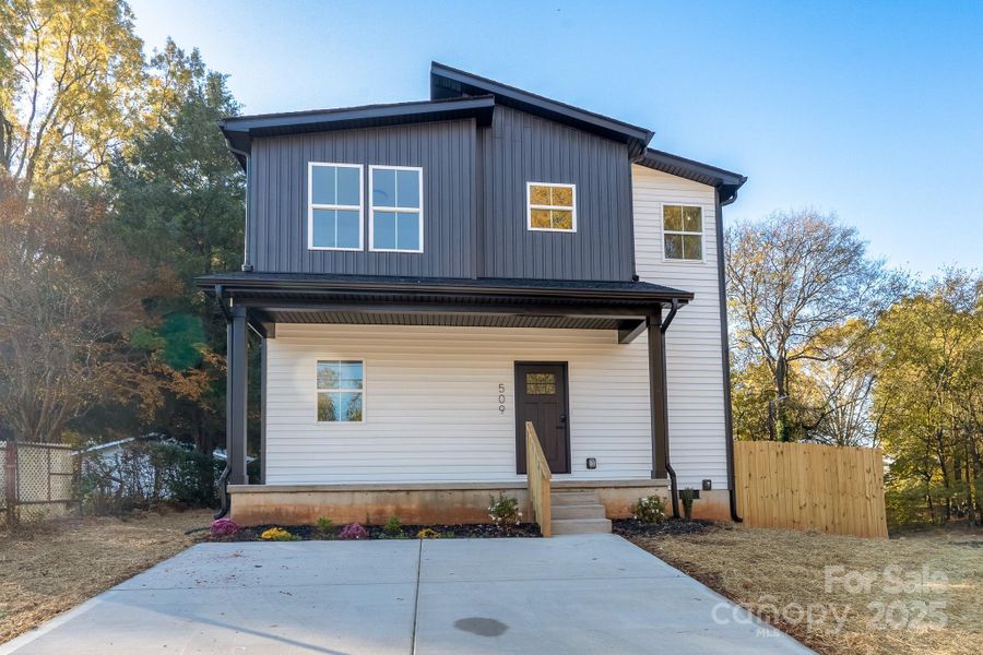Front exterior of a new home in , Kannapolis, NC, highlighting curb appeal (Image 1). Front exterior of a new home in , Kannapolis, NC, highlighting curb appeal (Image 1).