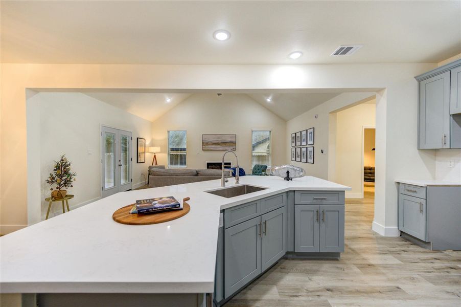 Discover the spacious kitchen with modern cabinetry and an inviting open layout.