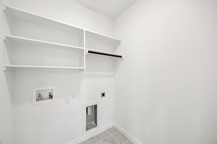 Utility Room in the Spruce home plan by Trophy Signature Homes - REPRESENTATIVE PHOTO