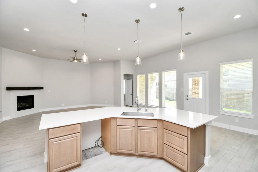 All of this overlooks your expansive family room, creating a perfect space for culinary delights and family gatherings. All of this overlooks your expansive family room, creating a perfect space for culinary delights and family gatherings.