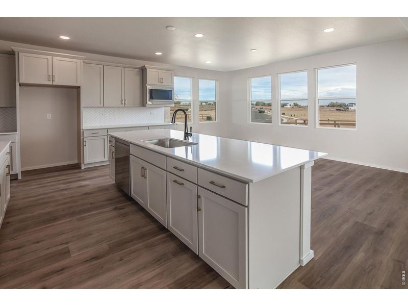 Furnished interior view inside a new home in Prairie Song Story Collection - Single Family Homes, Windsor (Image 10).