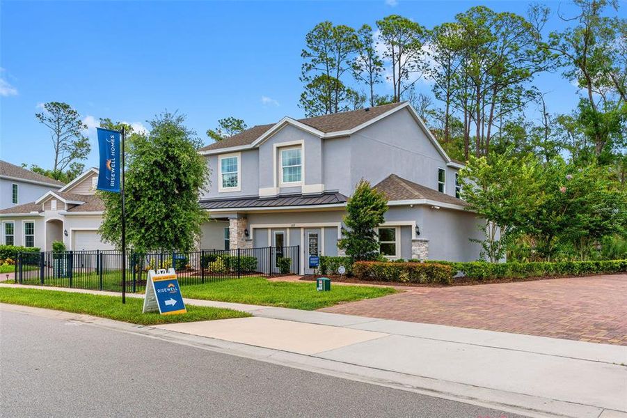 Front exterior of a new home in , Deland, FL, highlighting curb appeal (Image 29).