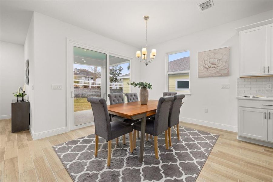 Furnished interior view inside a new home in Green Key Village, Lady Lake (Image 6).