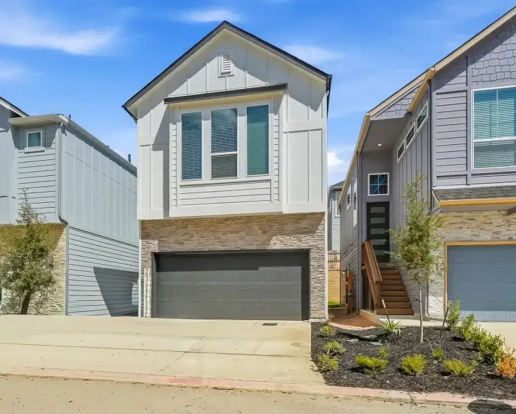 Front exterior of a new home in Rose Hill, San Antonio, TX, highlighting curb appeal (Image 2).