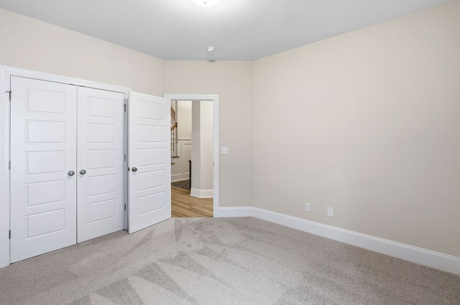 Representative unfurnished interior of a home built from the Kauai by Bill Clark Homes in The Sanctuary at Sunset Beach, Sunset Beach (Image 25).