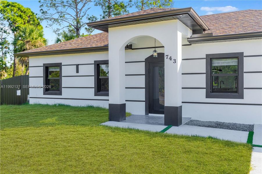 Exterior details and patio area of a home in , Lehigh Acres (Image 23). Exterior details and patio area of a home in , Lehigh Acres (Image 23).