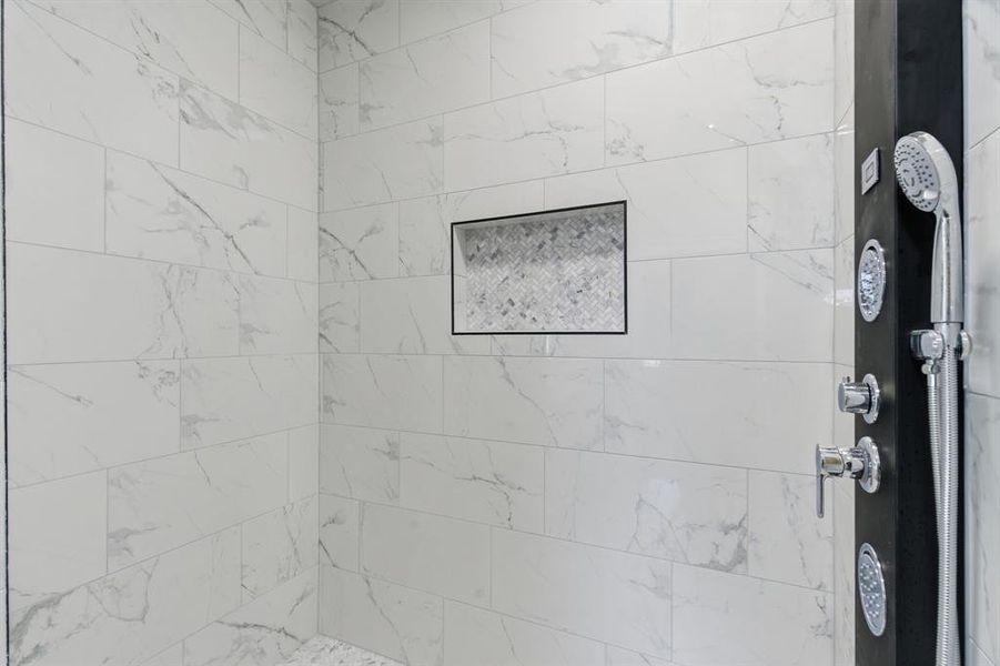 Bathroom view of tiled shower