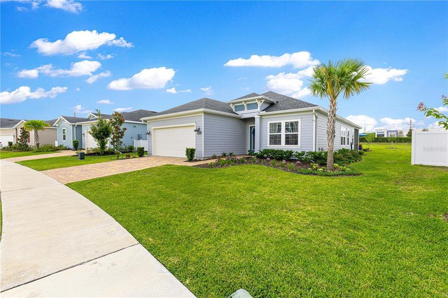 Front exterior of a new home in , Ocala, FL, highlighting curb appeal (Image 27).