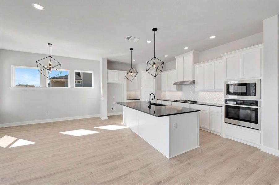 Furnished interior view inside a new home in Treeline, Justin (Image 9).