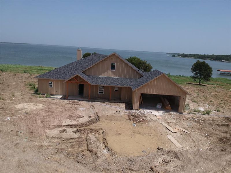 View of front of property featuring a water view