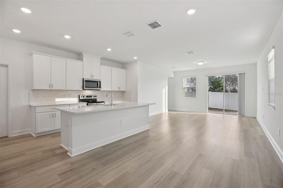Furnished interior view inside a new home in Cyrene at Minneola - Villas, Minneola (Image 6).