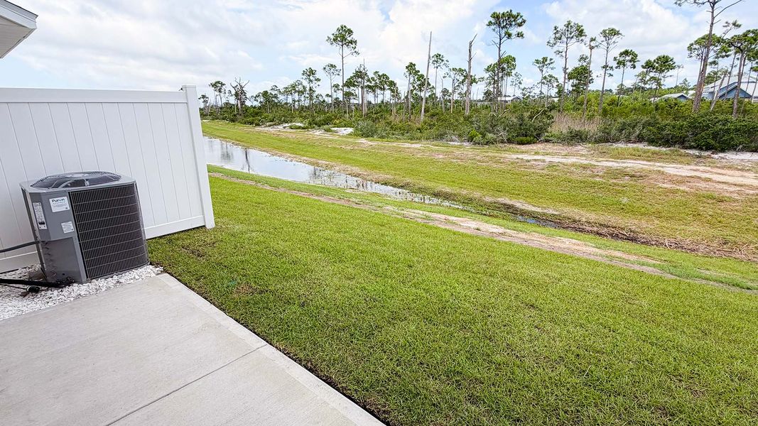 Exterior details and patio area of a home in WindMark Beach, Port Saint Joe (Image 22).