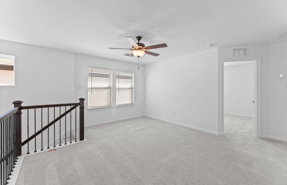 Representative unfurnished interior of a home built from the Alexander by Pulte Homes in Wolf Ranch, Georgetown (Image 10).