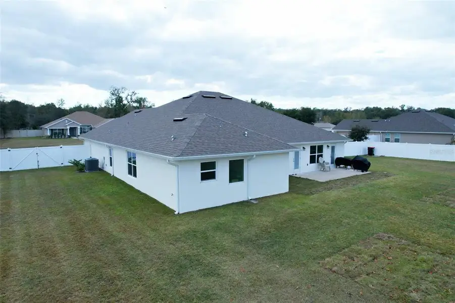 Exterior details and patio area of a home in Dorchester, Ocala (Image 4).