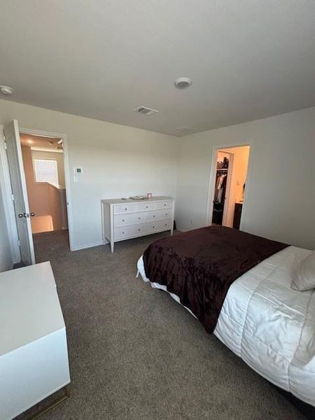Wall-to-wall carpeting in a neutral tone