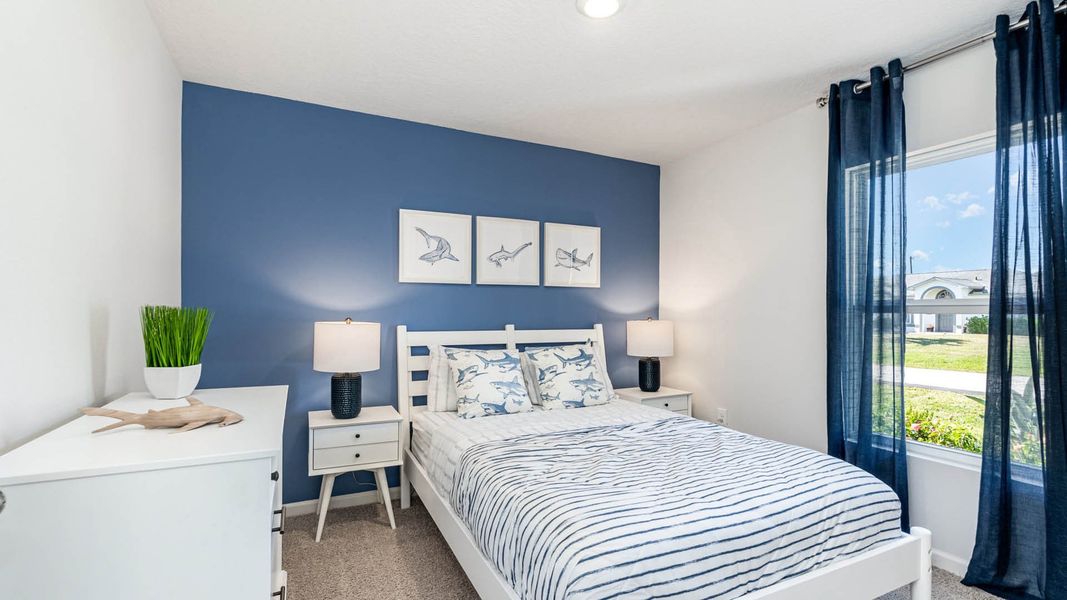 Furnished interior view inside a new home in Gardenside at Ormond Station, Ormond Beach (Image 5).