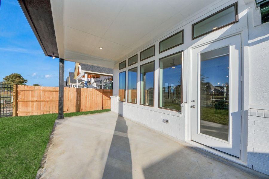 Exterior details and patio area of a home in Elyson, Katy (Image 29).