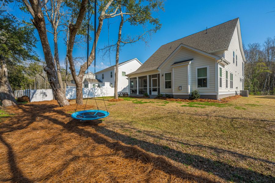 Exterior details and patio area of a home in , Awendaw (Image 26).