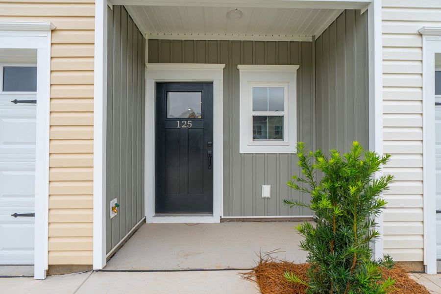 Front exterior of a new home in , Goose Creek, SC, highlighting curb appeal (Image 2).