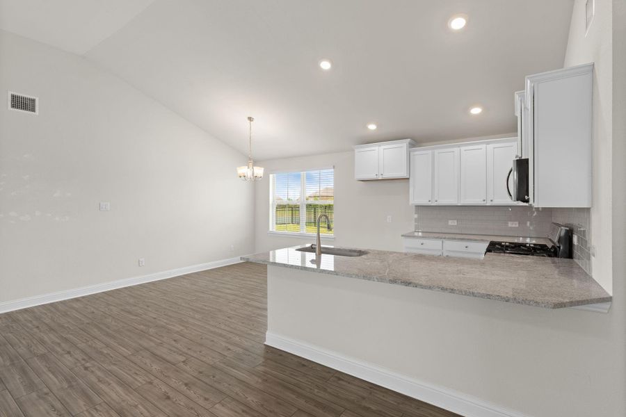Furnished interior view inside a new home in Sunterra, Katy (Image 13).