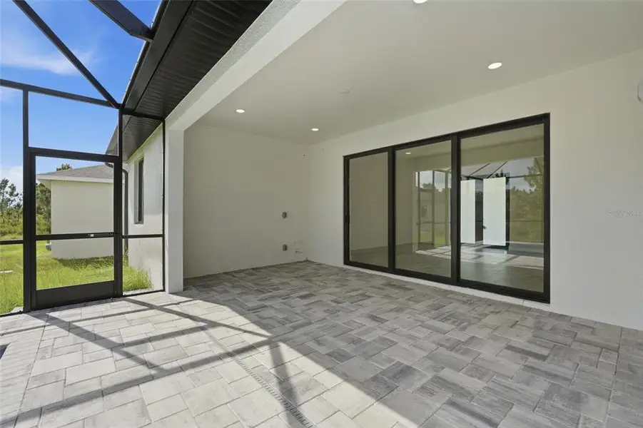 Exterior details and patio area of a home in , Port Charlotte (Image 25). Exterior details and patio area of a home in , Port Charlotte (Image 25).