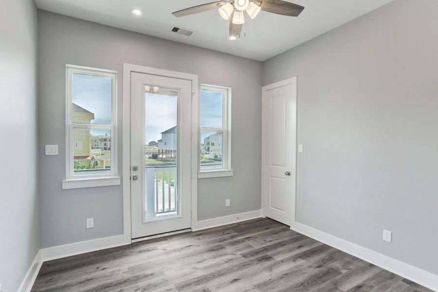 1st level guest room measures 11'2" X 10'9" and offers balcony access and an en suite full bath. 1st level guest room measures 11'2" X 10'9" and offers balcony access and an en suite full bath.