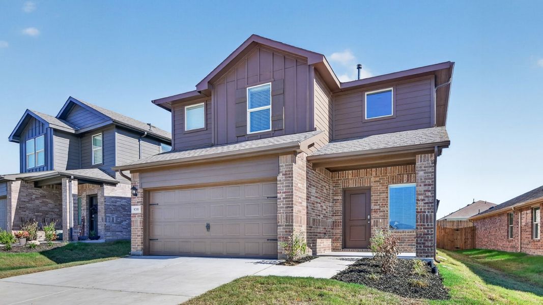 Representative exterior photo of a completed home built from the Renae by D.R. Horton in The Hills at Reunion, Newark, TX (Image 18).