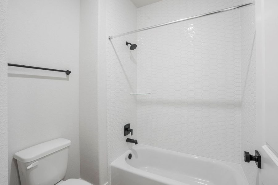 Furnished interior view inside a new home in The Woodlands Hills, Willis (Image 14).