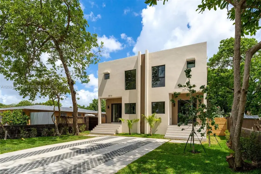 Front exterior of a new home in , Miami, FL, highlighting curb appeal (Image 26).