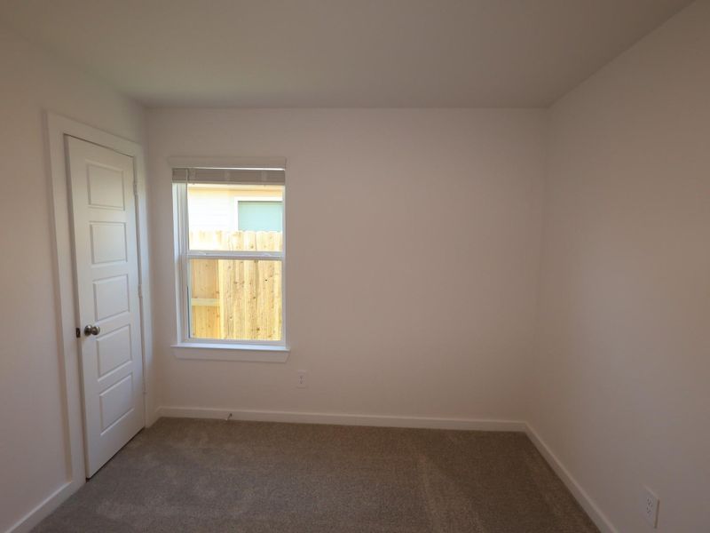 Spacious, unfurnished interior of a new home in Pinewood at Grand Texas, New Caney (Image 4).