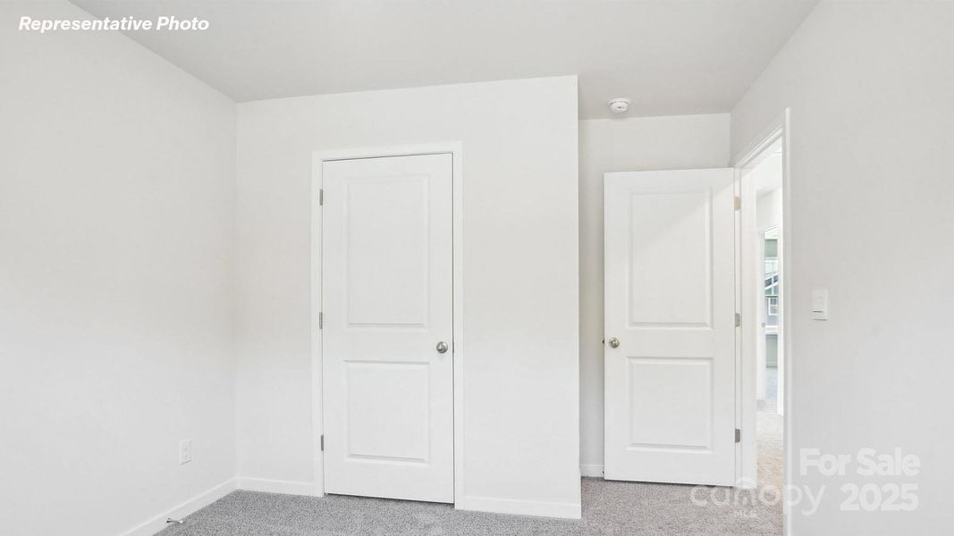 Spacious, unfurnished interior of a new home in Reedy Creek Preserve, Charlotte (Image 23).