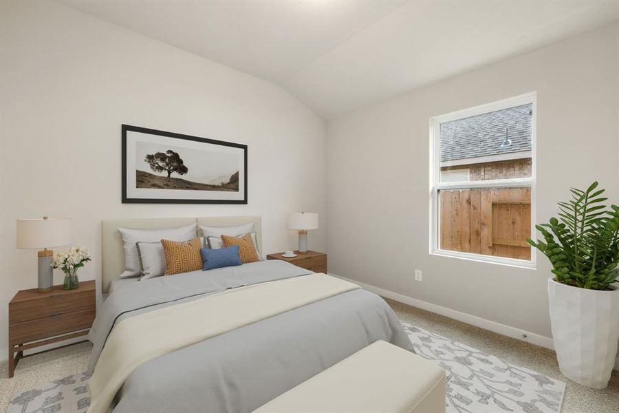 Secondary bedroom features plush carpet, neutral paint, and a large window with plenty of natural light.