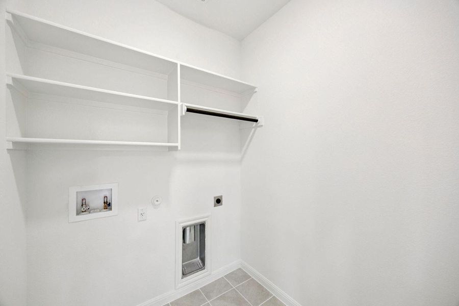 Utility Room in the Spruce home plan by Trophy Signature Homes - REPRESENTATIVE PHOTO