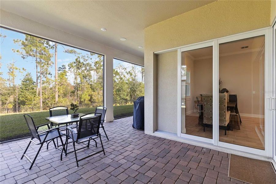 Exterior details and patio area of a home in Del Webb Sunbridge, St. Cloud (Image 29).